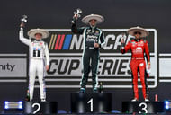 Shane Van Gisbergen celebrates on the podium after winning the Cup Series Mexico alongside second place driver Christopher Bell and third place driver Chase Elliott - Source: Imagn